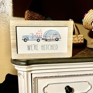 We're Hitched Sign with Blue Truck and Trailer